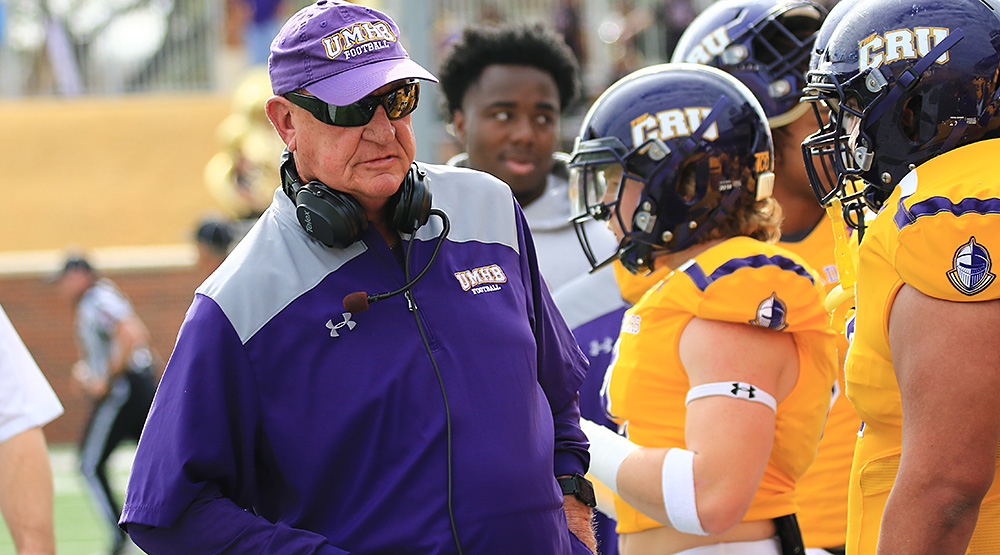 Pete Fredenburg on the sidelines in the second-round playoff game against Berry, wearing sunglasses. (Photo by Joe Fusco, d3photography.com)