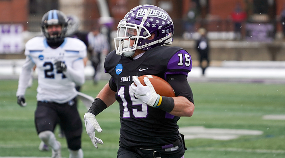 Trevor Cox runs up the sidelines to finish off his pick-six of Johns Hopkins. (Photo by Dan Poel, Ohiosi.com)