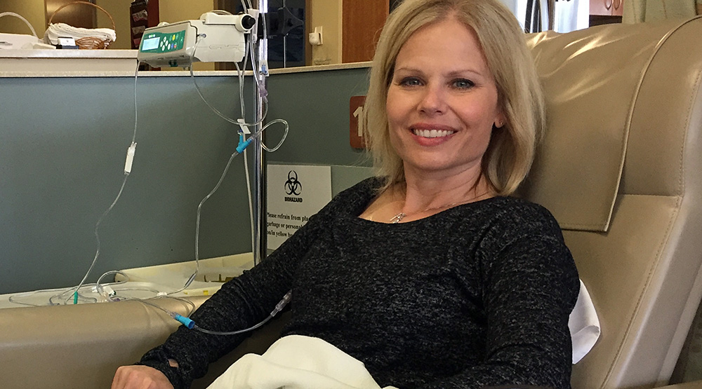 Rachael Caruso, wife of St. Thomas football coach Glenn Caruso, receiving chemo treatments in May. (Caruso family photo)