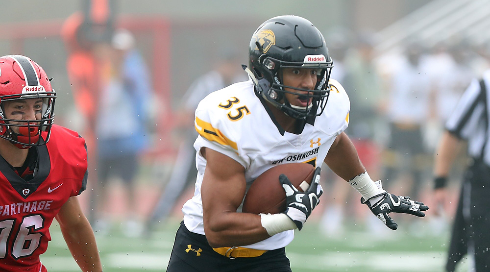 Derrick Jennings runs back one of his three picks.